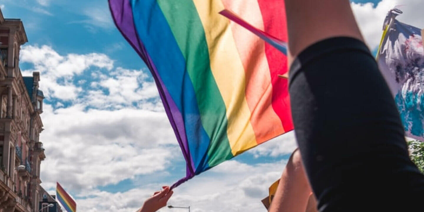 Rainbow flag being waved